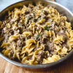 Ground beef stroganoff recipe served over noodles